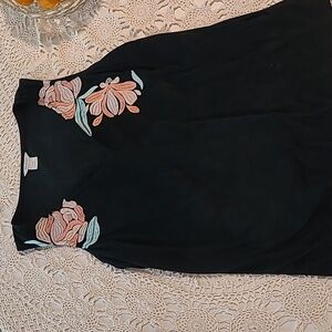 Woman Gorgeous Ariat two way tank size L. Black with raised roses on it. Soft.